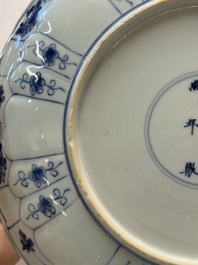 Seven Chinese blue and white plates with floral design, Kangxi