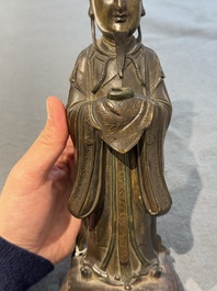 A Chinese bronze figure of an official, Ming
