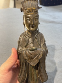 A Chinese bronze figure of an official, Ming