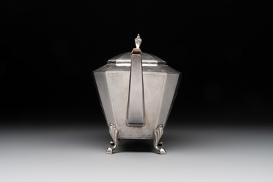 A Chinese silver covered teapot, sugar jar and milk jug with bamboo design, Tackhing 90% silver mark, 20th C.