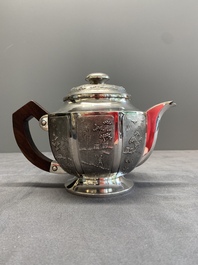 Two Vietnamese silver teapots and a covered sugar bowl, marked Donghung, ca. 1900