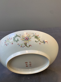 A Chinese famille rose yellow-ground 'Antiquities' plate, Guangxu mark, 19/20th C.