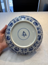 Seven Chinese blue and white plates with floral design, Kangxi