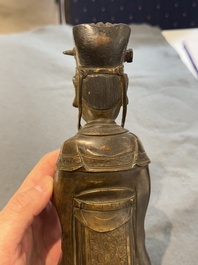 A Chinese bronze figure of an official, Ming