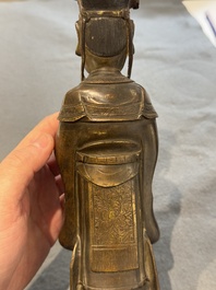 A Chinese bronze figure of an official, Ming