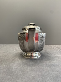 Two Vietnamese silver teapots and a covered sugar bowl, marked Donghung, ca. 1900