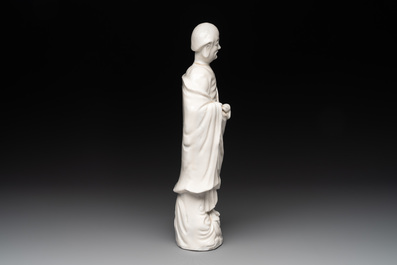 Two Chinese Dehua blanc de Chine wine cups and a figure of Liuhai, 18/19th C.