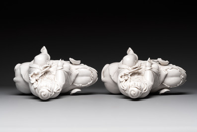 Two Chinese Dehua blanc de Chine sculptures of the Guanyin seated on an elephant, He Chaozong 何朝宗 and Dehua 德化 marks, 20th C.