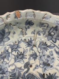 A Chinese blue and white 'phoenix' dish and two 'Buddhist lion' and 'peony' plates, Hongzhi/Zhengde