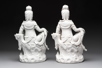 Two Chinese Dehua blanc de Chine sculptures of the seated Guanyin, He Chaozong 何朝宗 and Dehua 德化 marks, 20th C.