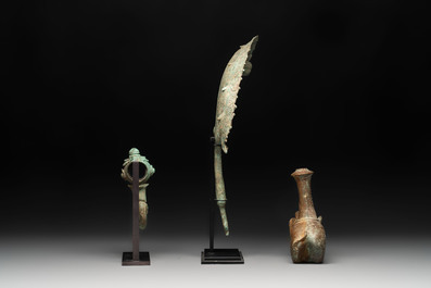 Three palanquin hooks, a bronze sculpture of naga Mucalinda and an elephant-form kendi, Cambodia, 13th C. and earlier