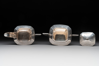 A Chinese silver covered teapot, sugar jar and milk jug with bamboo design, Tackhing 90% silver mark, 20th C.
