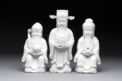 A set of three Chinese Dehua blanc de Chine 'Sanxing' figures, 20th C.