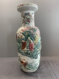 A pair of Chinese famille rose '18 Luohan' vases with relief design, 19th C.