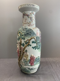 A pair of Chinese famille rose '18 Luohan' vases with relief design, 19th C.