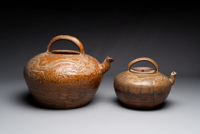 Two brown-glazed 'dragon' ewers with relief design, Qing