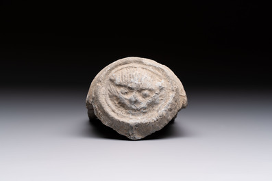 A Chinese cream-glazed pillow, a grey terracotta roof tile and a grey-glazed cover, Republic and earlier