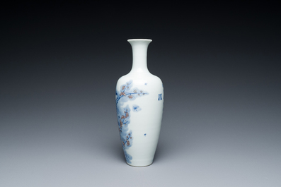 A Chinese blue, white and copper-red 'magpie and prunus' vase, Kangxi mark, 19/20th C.