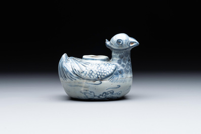 A Chinese blue and white 'double mandarin duck' ewer or water dropper on wooden stand, Ming, ca. 1500