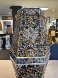 A rare Chinese hexagonal copper-red, blue and white brown-ground vase, 19th C.