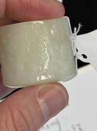 A fine Chinese white jade inscribed archer ring, Zigang 子岡 mark, 18th C.