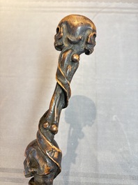 A finely carved boxwood 'vanitas' or 'memento mori' stick, 18/19th C.
