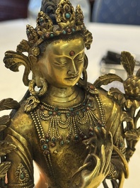 A fine Sino-Tibetan turquoise- and coral-inlaid gilt-bronze Buddha Maitreya, Kangxi