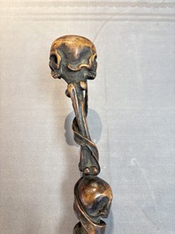 A finely carved boxwood 'vanitas' or 'memento mori' stick, 18/19th C.