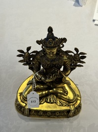 A fine Sino-Tibetan turquoise- and coral-inlaid gilt-bronze Buddha Maitreya, Kangxi