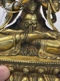 A fine Sino-Tibetan turquoise- and coral-inlaid gilt-bronze Buddha Maitreya, Kangxi