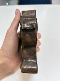 A Tibetan copper Gawu box and tsa tsa mold, 19th C.
