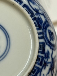 A pair of Chinese blue and white saucer dishes, Qianlong mark, 19th C.