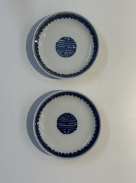 A pair of Chinese blue and white saucer dishes, Qianlong mark, 19th C.