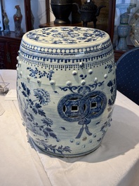 A Chinese blue and white 'birds among flowering branches' garden seat, 19th C.