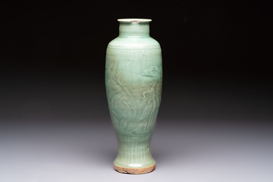 A Chinese Longquan celadon vase with incised floral design, Transitional period