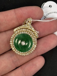 A diamond- and jadeite-inlaid gold pendant, 20th C.