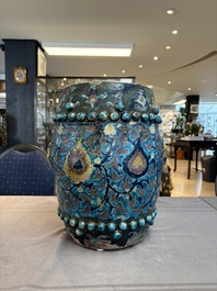 A Chinese Fahua barrel-shaped 'lotus scroll' stool with incised design, Ming
