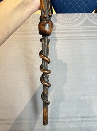 A finely carved boxwood 'vanitas' or 'memento mori' stick, 18/19th C.