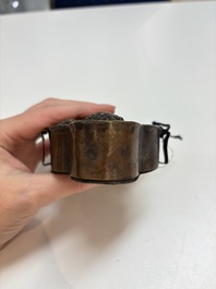 A Tibetan copper Gawu box and tsa tsa mold, 19th C.