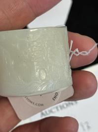 A fine Chinese white jade inscribed archer ring, Zigang 子岡 mark, 18th C.