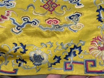 An imperial Chinese embroidered silk gold-thread yellow-ground cushion cover, Qianlong/Jiaqing