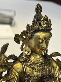 A fine Sino-Tibetan turquoise- and coral-inlaid gilt-bronze Buddha Maitreya, Kangxi