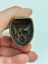 A Tibetan copper Gawu box and tsa tsa mold, 19th C.