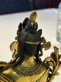 A fine Sino-Tibetan turquoise- and coral-inlaid gilt-bronze Buddha Maitreya, Kangxi