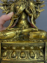 A fine Sino-Tibetan turquoise- and coral-inlaid gilt-bronze Buddha Maitreya, Kangxi