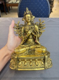 A fine Sino-Tibetan turquoise- and coral-inlaid gilt-bronze Buddha Maitreya, Kangxi