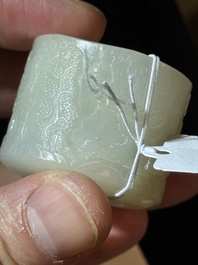 A fine Chinese white jade inscribed archer ring, Zigang 子岡 mark, 18th C.