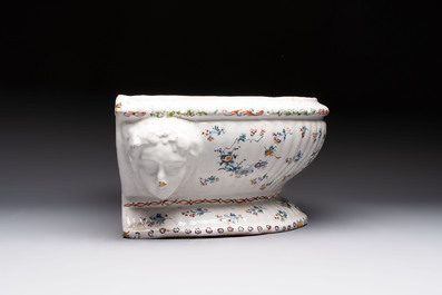 A large Brussels faience 'A la Haie Fleurie' water basin, 18th C.