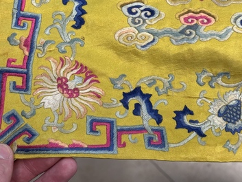 An imperial Chinese embroidered silk gold-thread yellow-ground cushion cover, Qianlong/Jiaqing