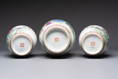 Seven Chinese famille rose vases, a scroll jar and a jardini&egrave;re on a stand, Qianlong marks, 20th C.